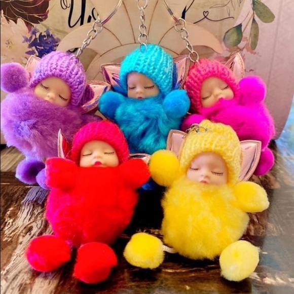 SLEEPY BABY WITH FAIRY WINGS SMALL POMPON IN YELLOW KEYCHAIN CHARM - Picture 4 of 6